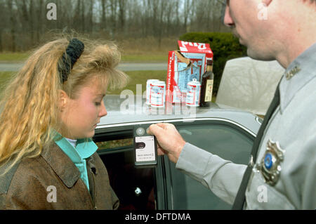 police officer alcohol test shows breathalyser device alamy breath results teen female