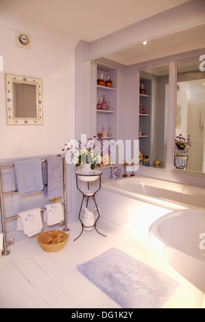 White French Bathroom With Mirror Above Fireplace And Chest Of Drawers