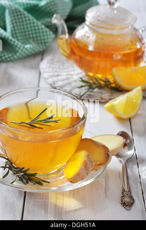 Herbal Tea With Lemon And Rosematy In Glass Teapot Closeup Stock Photo