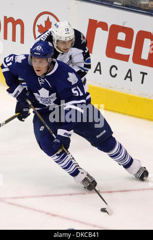 Toronto Maple Leafs Defenceman Jake McCabe 22 Skates With The Puck As