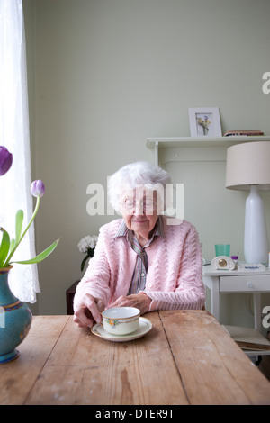 Smiling Woman With Cup Stock Photo Alamy