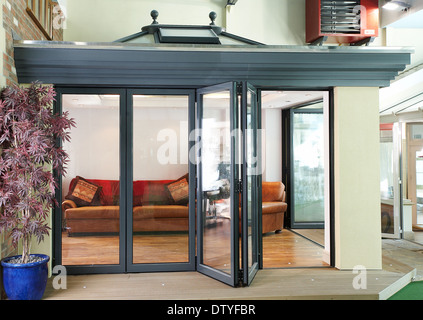 A series of images showing folding doors and skylight on an ... A series of images showing folding doors and skylight on an ...