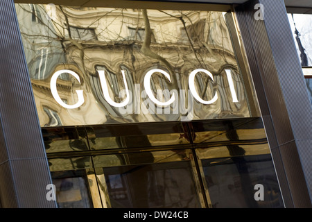 Gucci store / shop-front, with logo and characteristic gold colour Stock Photo, Royalty Free ...