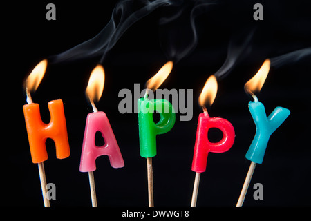 Candles Burning Saying Happy Stock Photo Alamy