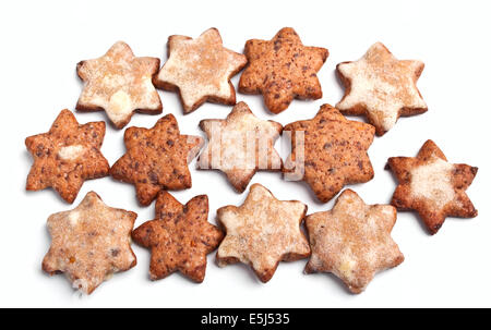 A Pile Of Star Shaped Homemade Christmas Cookies With A Cookie Form