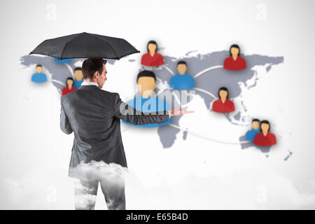 Businessman Holding An Umbrella With Hand Out Stock Photo Alamy