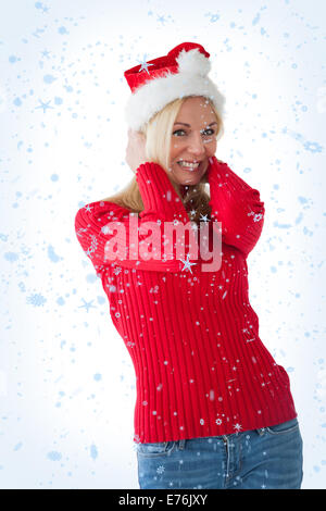 Composite Image Of Festive Blonde Smiling At Camera Stock Photo Alamy