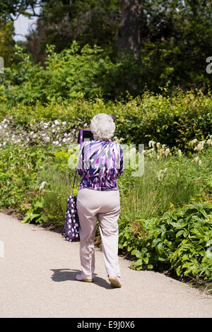 Mature Woman Using IPad Stock Photo Alamy