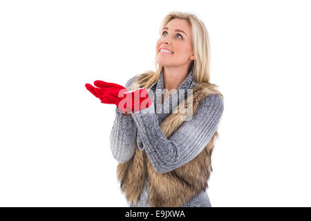 Blonde In Winter Clothes With Hands Out Stock Photo Alamy