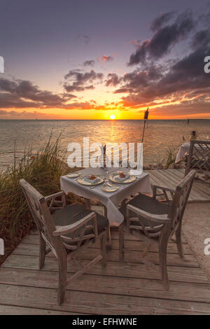 restaurant dining room at sunset, little palm island resort restaurant dining room at sunset, little palm island resort