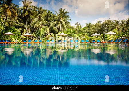 Tropical Swimming Pool Views Over The Water And Under Water Stock Photo