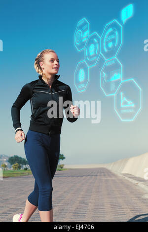 Fit Blonde Jogging On The Pier Stock Photo Alamy