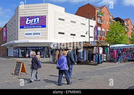 Romford Market Stall With Bargain Clothing On Hanging Rails With Stock ...