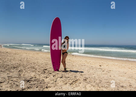 Girl In Pink Bikini With Surfboard Running To The Ocean Stock Photo Alamy