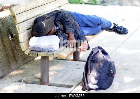 Black Homeless Man Sleeping In Park Stock Photo Alamy