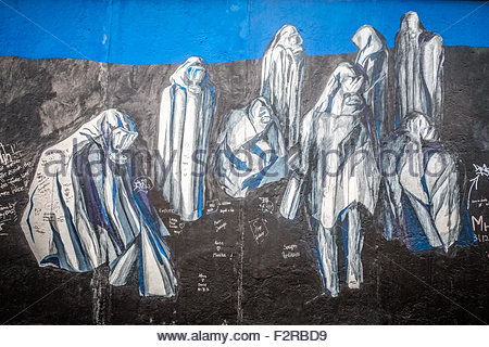 Berlin Wall Art political art spray painted on to the berlin wall. seen at the Berlin Wall Art political art spray painted on to the berlin wall. seen at the