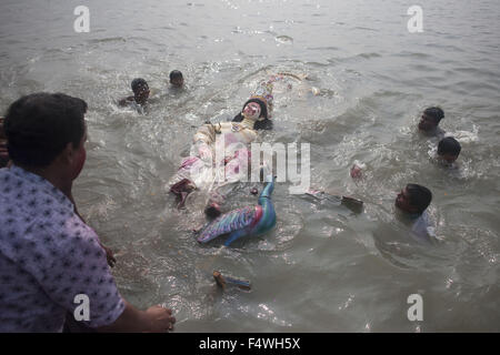 Bangladeshi Hindu Devotees Prepare To Submerge A Clay Idol Of The Hindu