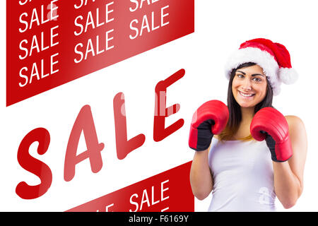 Composite Image Of Festive Brunette In Boxing Gloves Cheering Stock