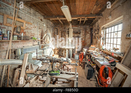 Interior traditional woodworking tool shop with variety ...