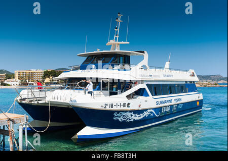 glass bottom boat alamy catamaran estartit brava harbor costa spain harbour pulling pick into