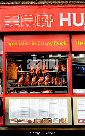 Crispy Duck Window Display Chinatown Chef Arranging Duck Pork Hanging