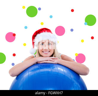 Composite Image Of Festive Fit Blonde Smiling At Camera Stock Photo Alamy