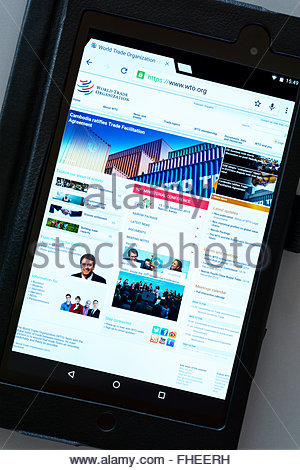 world trade organization app on an android tablet pc, dorset stock world trade organization app on an android tablet pc, dorset stock