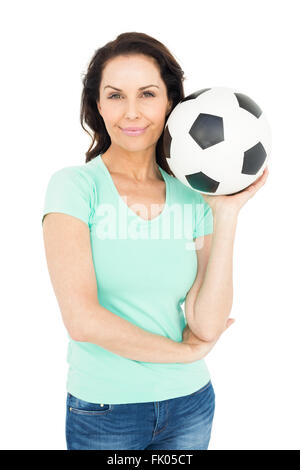 Pretty Brunette Holding Soccer Ball Stock Photo Alamy