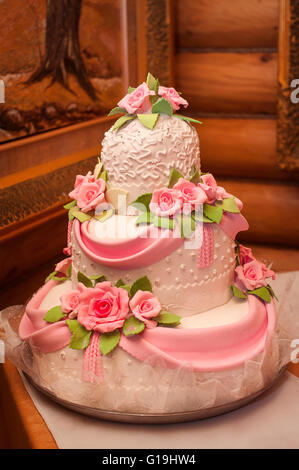 Three Tiered Purple Wedding Cake With Funny Cake Topper Stock Photo Alamy