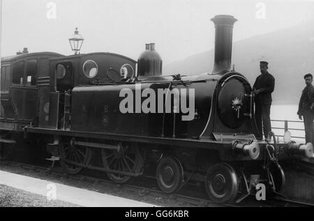 North British Railway 4-4-0t Steam Locomotive With A Passenger Train 