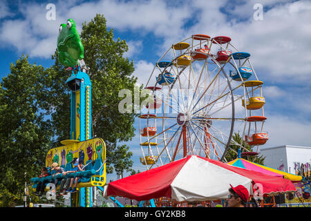 Colorful Midway Rides At The Corn And Apple Festival In Morden