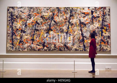 A Woman Looks At Blue Poles 1952 By Jackson Pollock During A