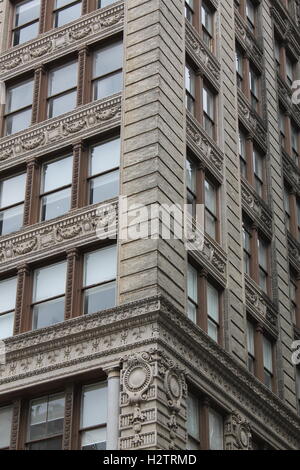 Vintage apartment building in New York City with arched windows ... ... A vintage apartment building in Manhattan, New York City - Stock Photo Vintage apartment building in New York City with arched windows ... ... A vintage apartment building in Manhattan, New York City - Stock Photo