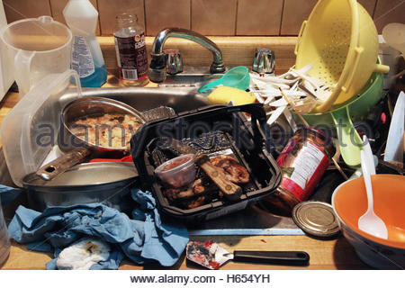 Kitchen Sink With Dishes as pile of dirty dishes in a kitchen sink stock photo, royalty Kitchen Sink With Dishes as pile of dirty dishes in a kitchen sink stock photo, royalty