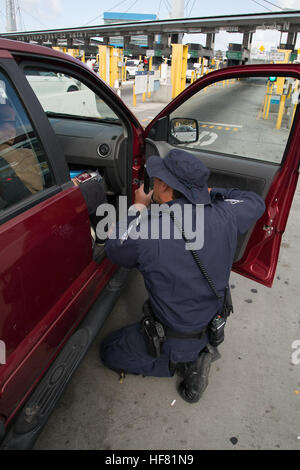 CBP Field Operations Officer Conducts Vehicle Inspection In The Stock ...