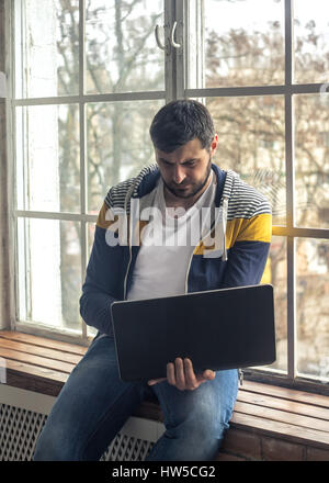 Mature Bearded Hipster Man Thinking With Mask For Protection From