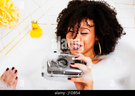 African Woman Relaxing In Bubble Bath Stock Photo Royalty Free Image