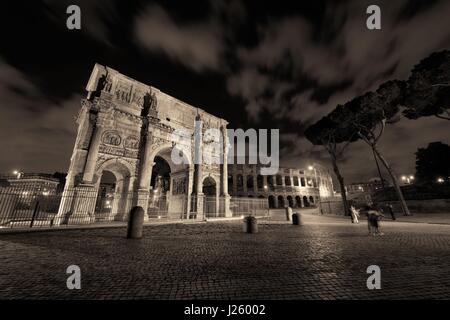 Colosseum In The Evening Arch Of Constantine In Backgorund Rome Italy