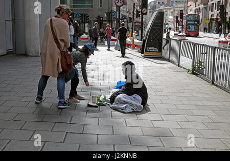 Man Giving Money To Beggar On Street Stock Photo, Royalty Free Image ...