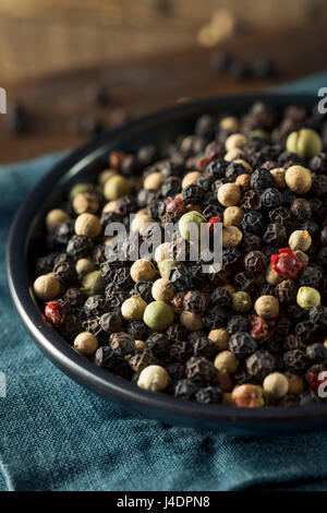 Fresh Hot Spicy Whole Raw Uncooked Chillies Agains A White Background