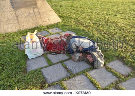 Homeless Man Sleeping On The Floor Stock Photo Alamy