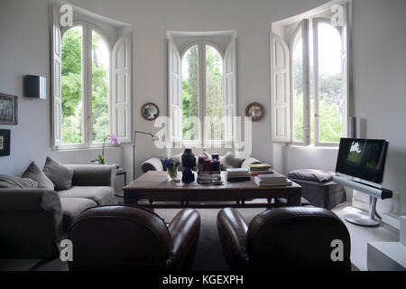 television and armchairs in living room stock photo black mirror white christmas streaming