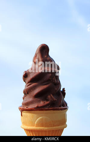 Dark Chocolate Isolated Against A Blue Background Stock Photo Alamy