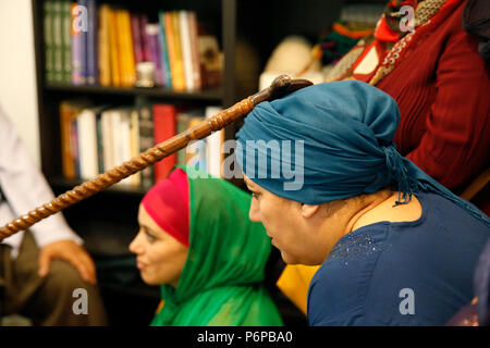 Sufi Muslim Receiving A Blessing From Mawlana Sheikh Mehmet Efendi In