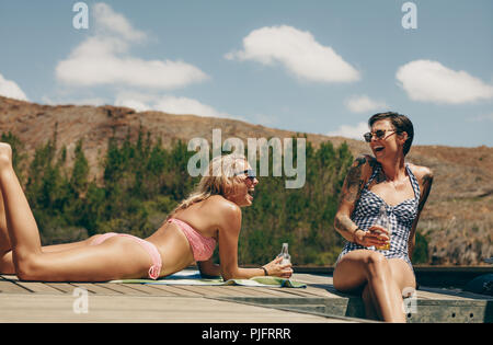 Two Happy Women In Bikini Enjoying On The Beach Stock Photo Alamy