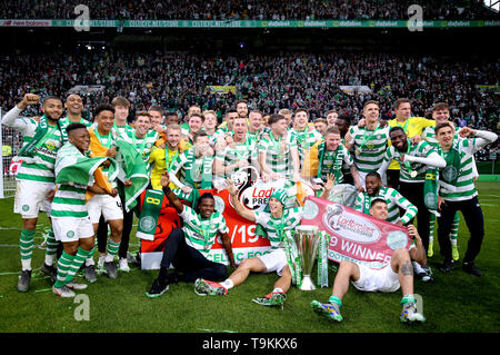 Celtic Players Celebrate With The Trophy After Winning The Premier