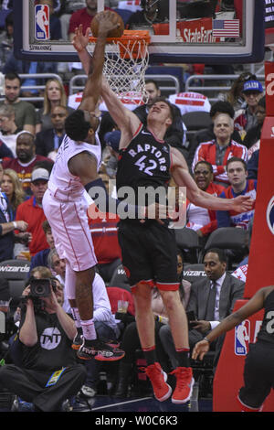 Toronto Raptors Center Jakob Poeltl Shoots The Ball As Washington