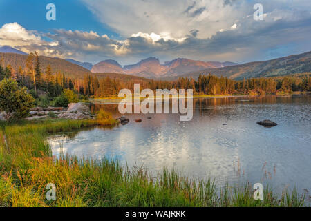 A Summer Sunrise On Hallett Peak Reflecting In Dream Lake In Rocky