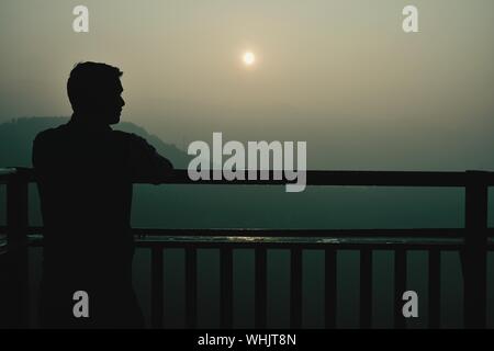 Man Leaning On The Railing Silhouette Illustration Stock Photo Alamy