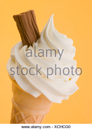 Soft Whipped Ice Cream With A Chocolate Flake In A Wafer Cone Stock